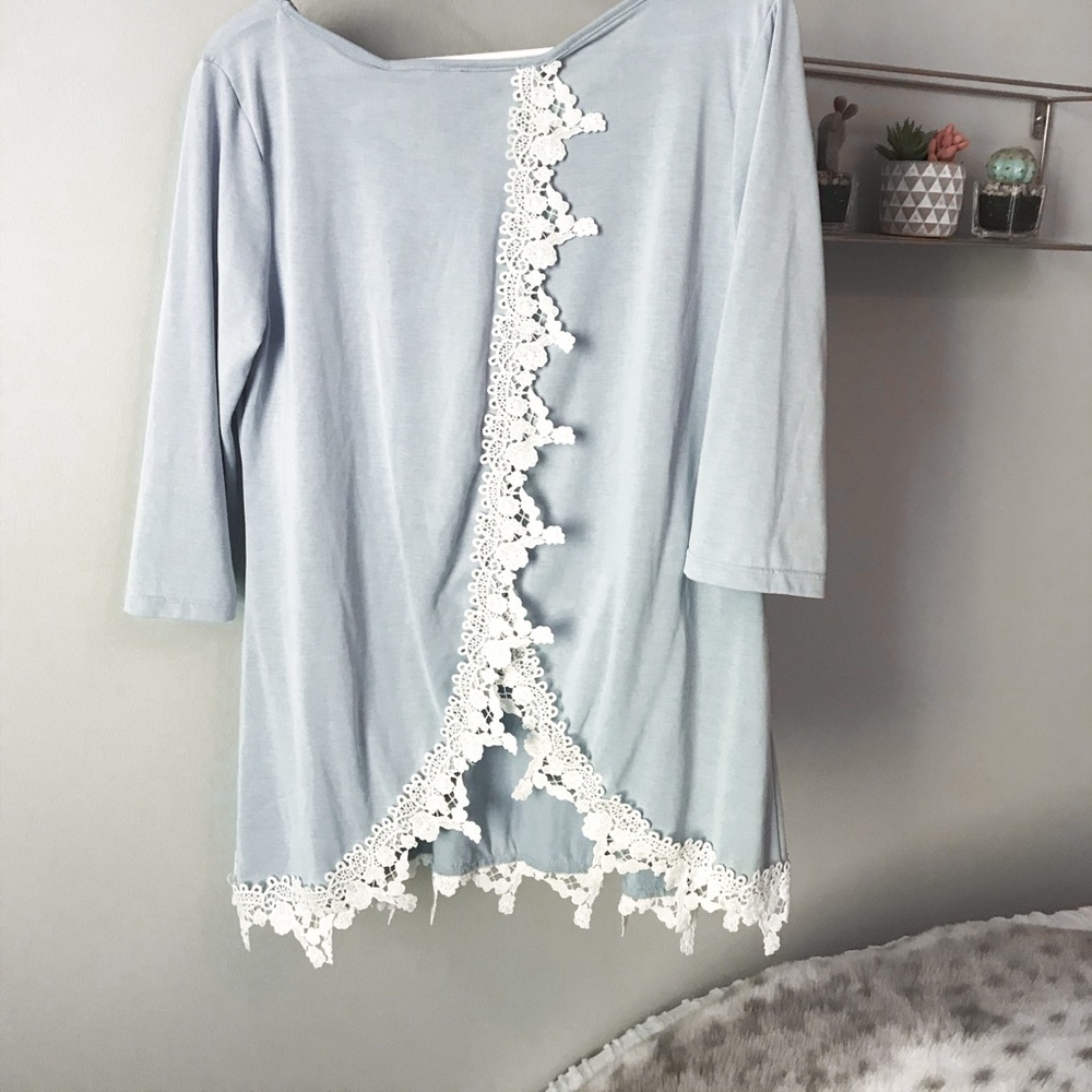 Blueish grey open back blouse with lace design